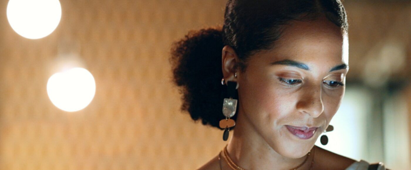 Smiling business professional working on innovation project on tablet