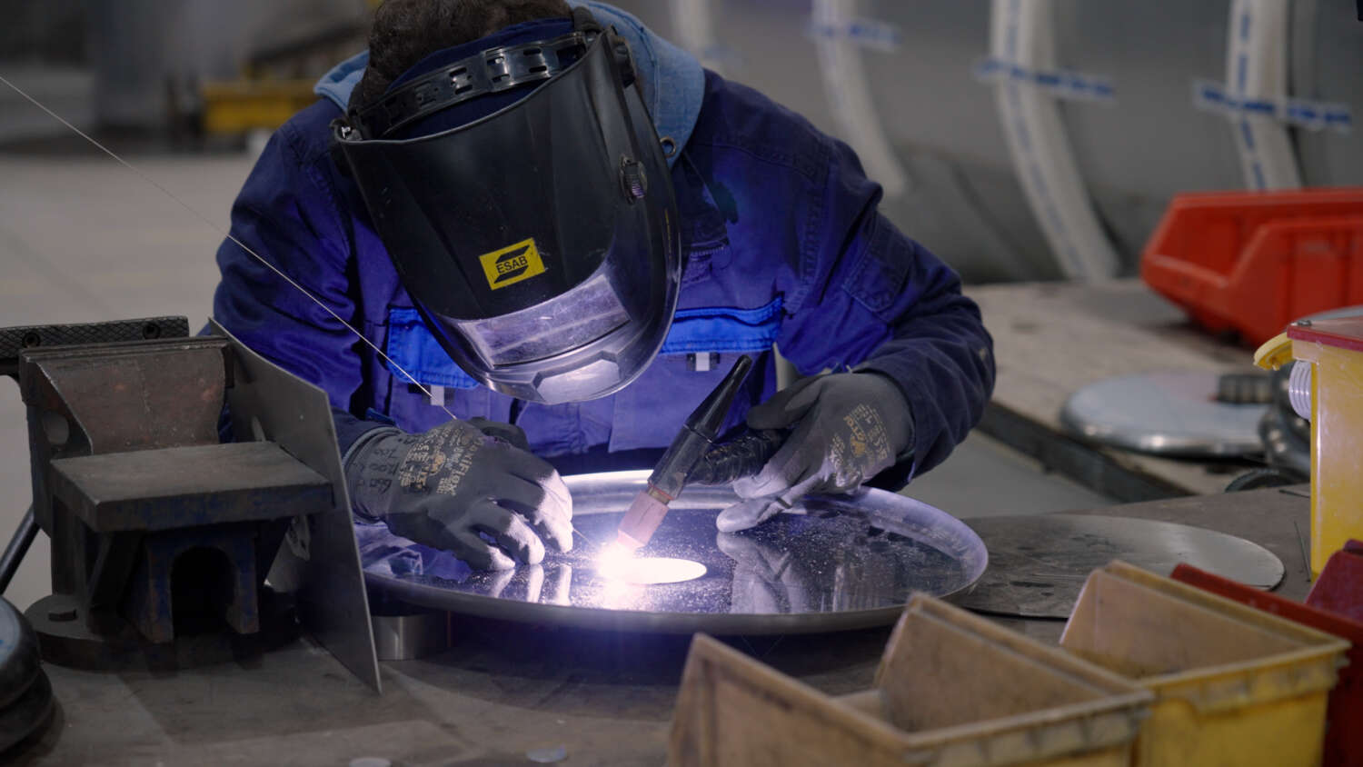 Welder in the Liscarroll warehouse