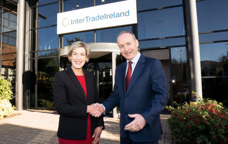 CEO Margaret Hearty shaking hands with Taoiseach Micheál Martin outside Inter Trade Ireland