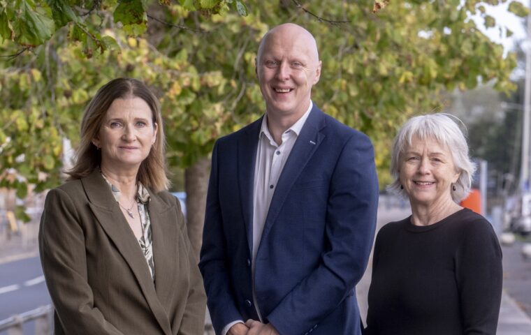 Paul Gunn, Anne Lanigan and Barbara Orr standing together outside The Alex hotel in Dublin during the launch of the Shared Island Sustainability Challenge Fund.