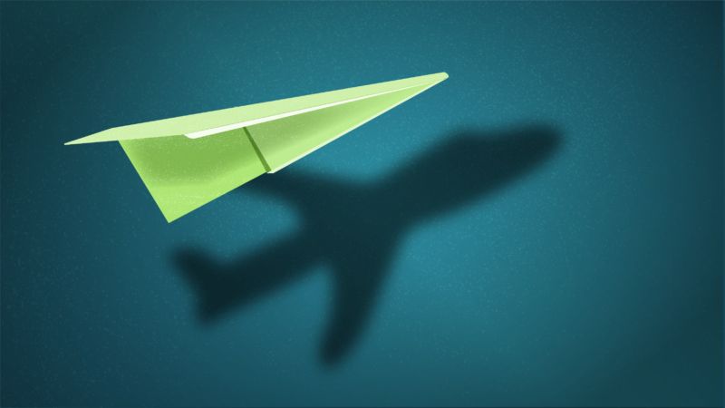 Green paper aeroplane